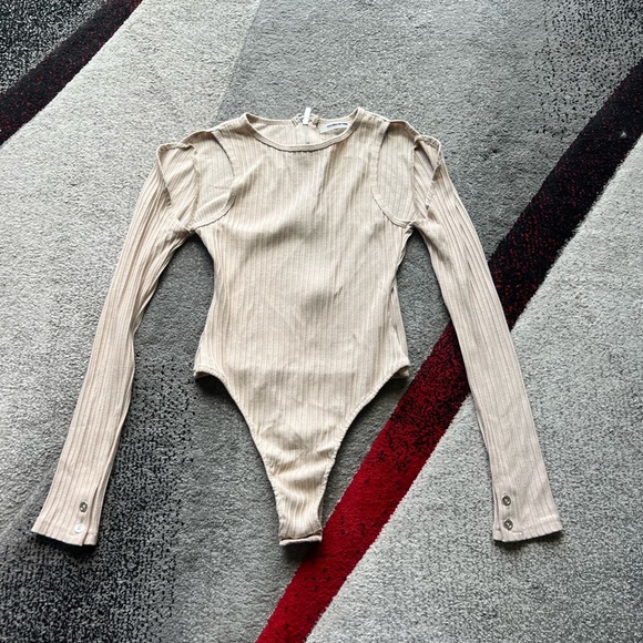 Maniere De Voir Tops - Maniere De Voir Beige Ribbed Cutout Long Sleeve Bodysuit